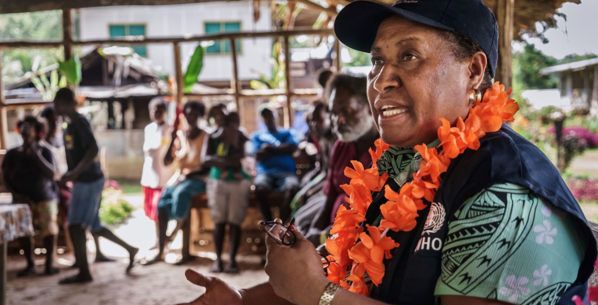 A WHO staff member in Papua New Guinea visits the community